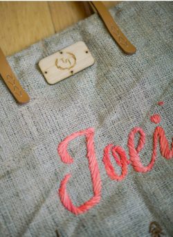 For a nice touch, add your wedding monogram or the initials of your entourage to make things more meaningful. Choose from hand-embroidered details, a laser-etched bamboo chip or foil stamped details for a one-of-a-kind gift.