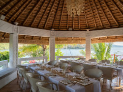 Welcome lunches can be organised on the beach or the airy restaurant with wrap-around bay views