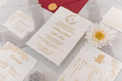Bespoke invitation design letterpress printed on deckle edge cotton paper. Photo by Amilon Ignacio Photography.